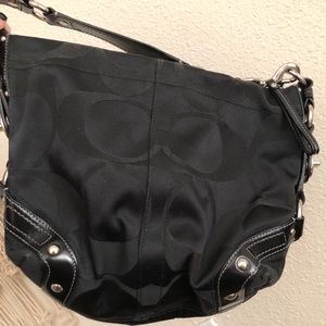 Black fabric coach purse